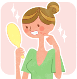 歯を鏡で見る女性